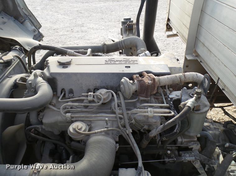 image for item DB2463 2004 Isuzu NPR flatbed truck