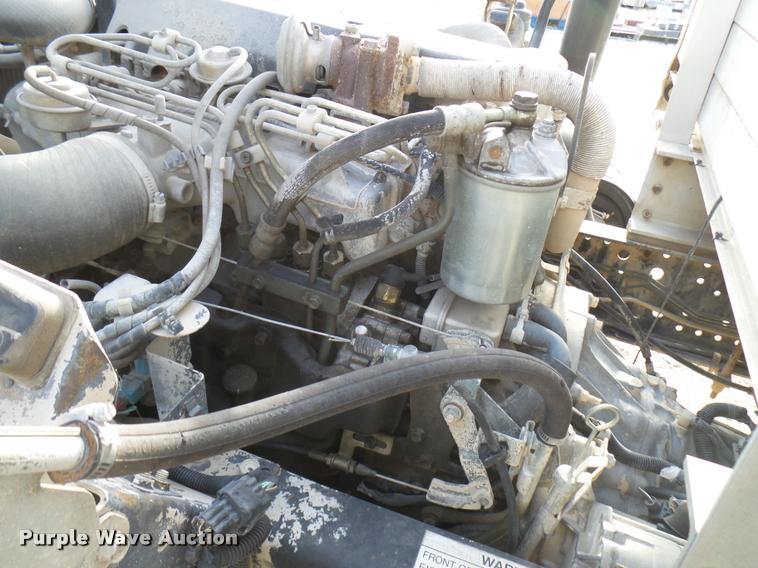 image for item DB2463 2004 Isuzu NPR flatbed truck