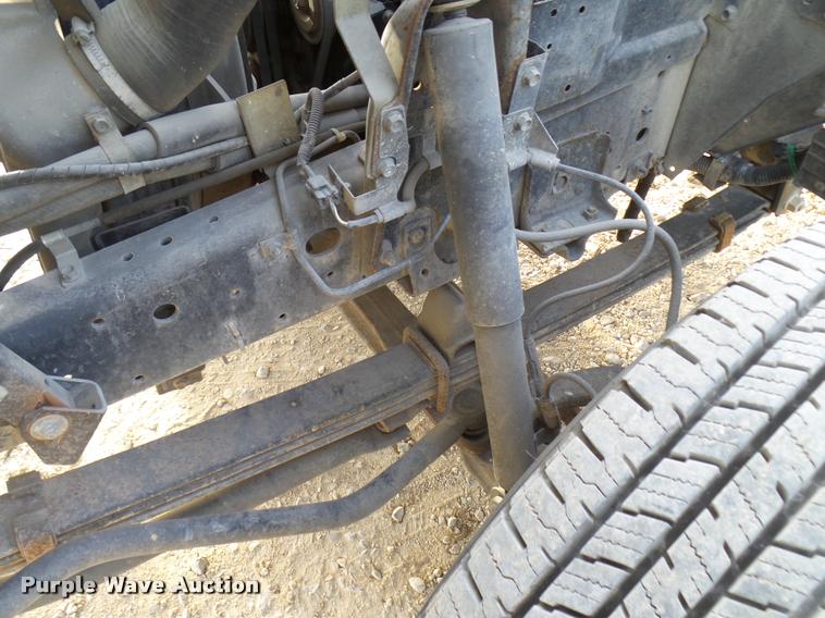 image for item DB2463 2004 Isuzu NPR flatbed truck