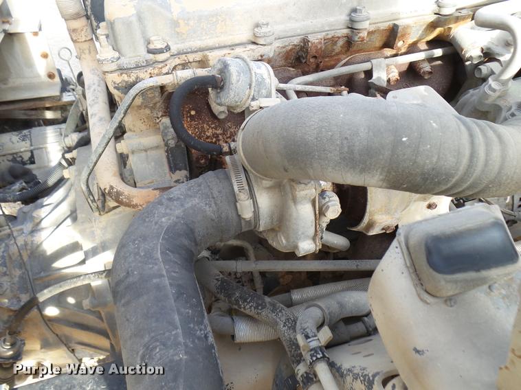 image for item DB2463 2004 Isuzu NPR flatbed truck