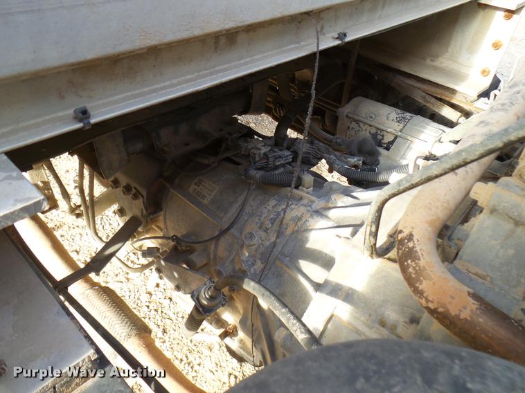 image for item DB2463 2004 Isuzu NPR flatbed truck