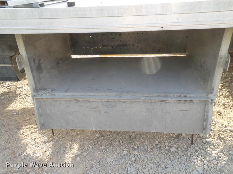 image for item DB2463 2004 Isuzu NPR flatbed truck