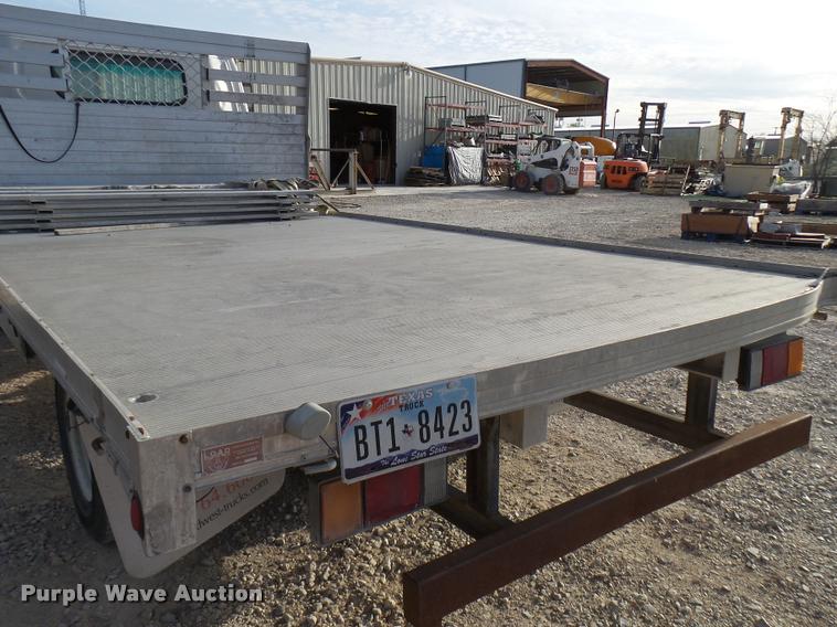 image for item DB2463 2004 Isuzu NPR flatbed truck