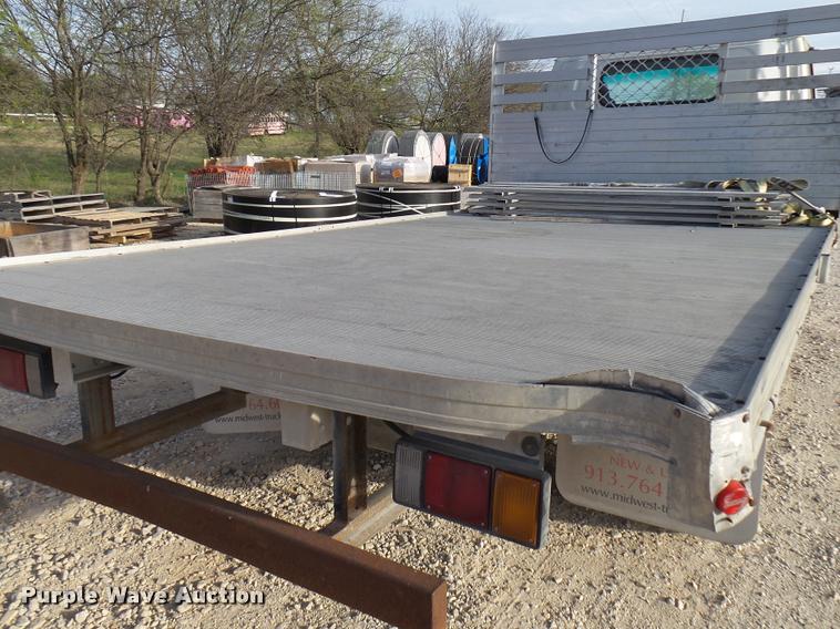 image for item DB2463 2004 Isuzu NPR flatbed truck