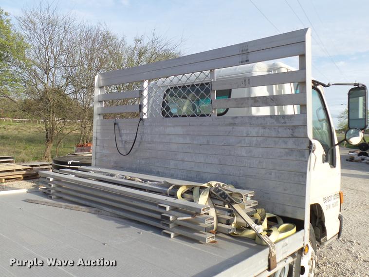 image for item DB2463 2004 Isuzu NPR flatbed truck