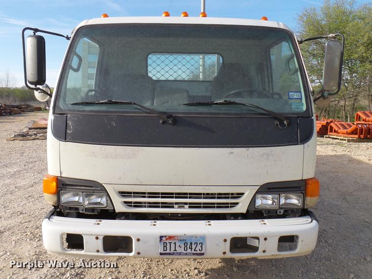 image for item DB2463 2004 Isuzu NPR flatbed truck