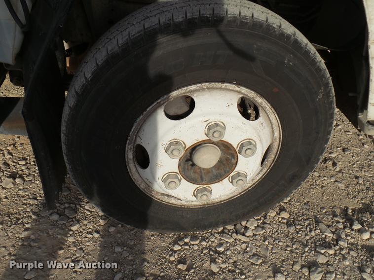 image for item DB2463 2004 Isuzu NPR flatbed truck