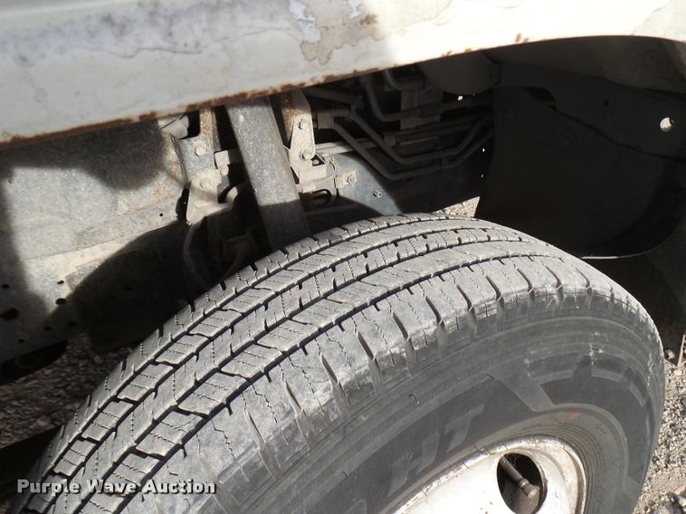 image for item DB2463 2004 Isuzu NPR flatbed truck