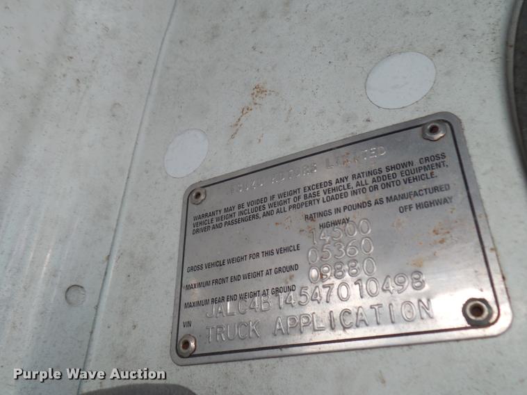 image for item DB2463 2004 Isuzu NPR flatbed truck