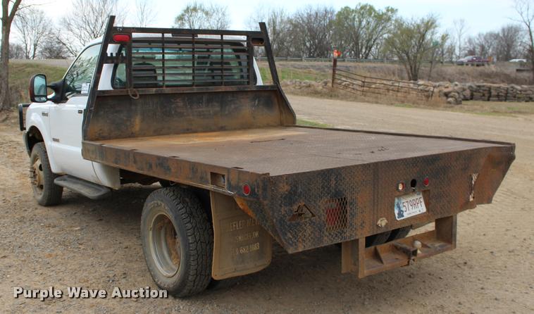 image for item L4954 2005 Ford F350 Super Duty flatbed pickup truck