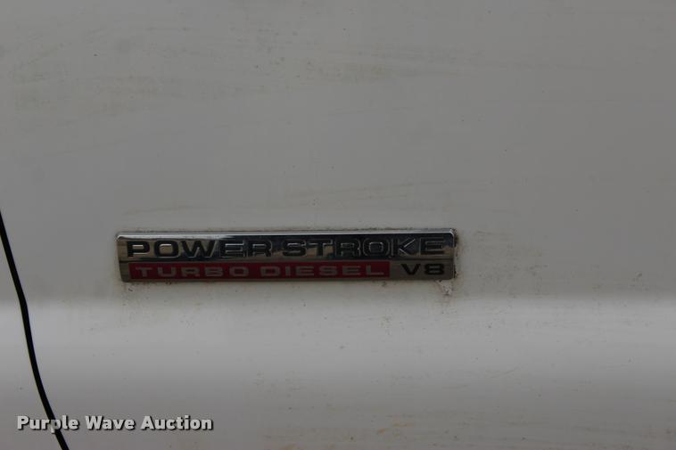 image for item L4954 2005 Ford F350 Super Duty flatbed pickup truck