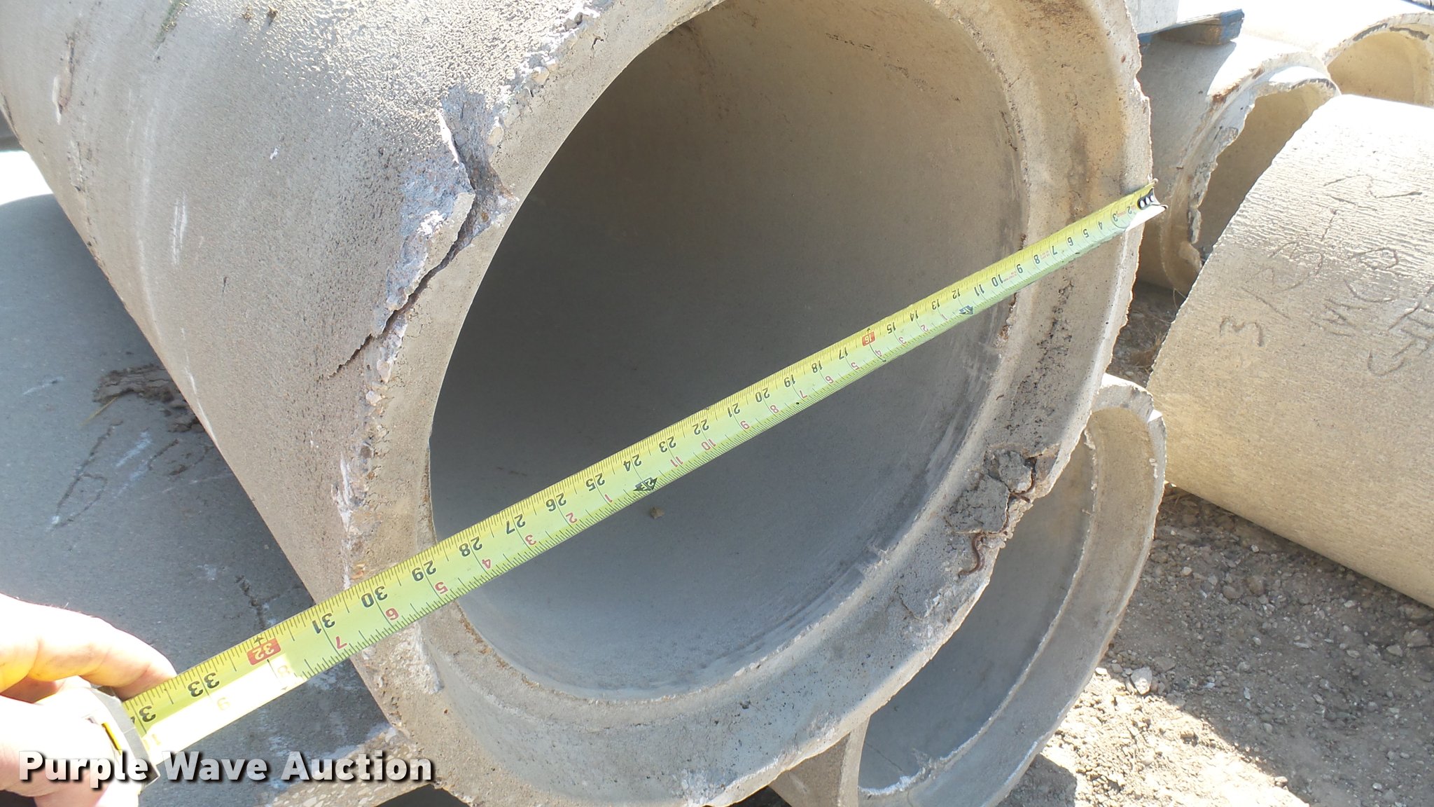 (12) concrete culvert pipes in Halstead, KS Item DQ9898 sold Purple