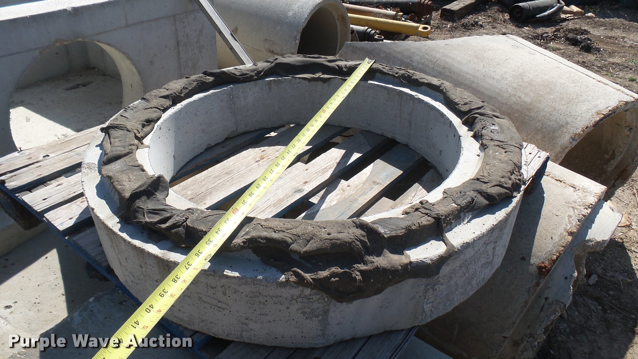 (12) concrete culvert pipes in Halstead, KS Item DQ9898 sold Purple