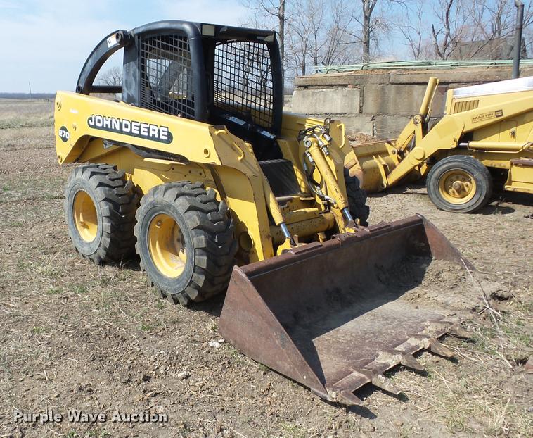 image for item AG9016 2000 John Deere 270 skid steer