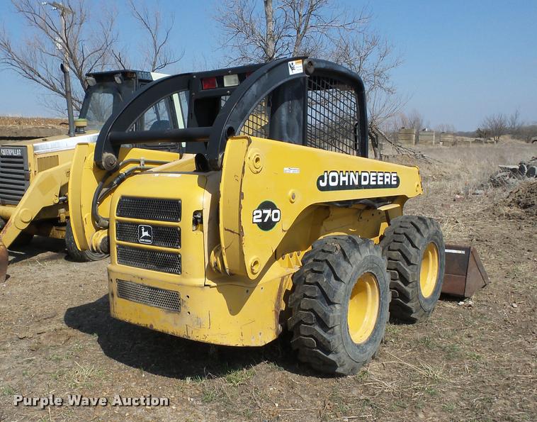 image for item AG9016 2000 John Deere 270 skid steer