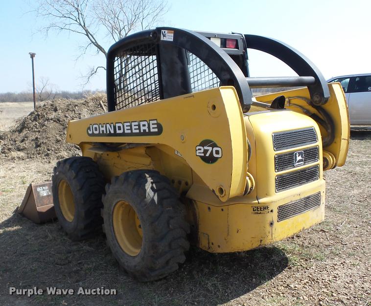 image for item AG9016 2000 John Deere 270 skid steer