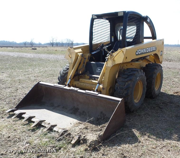 image for item AG9016 2000 John Deere 270 skid steer