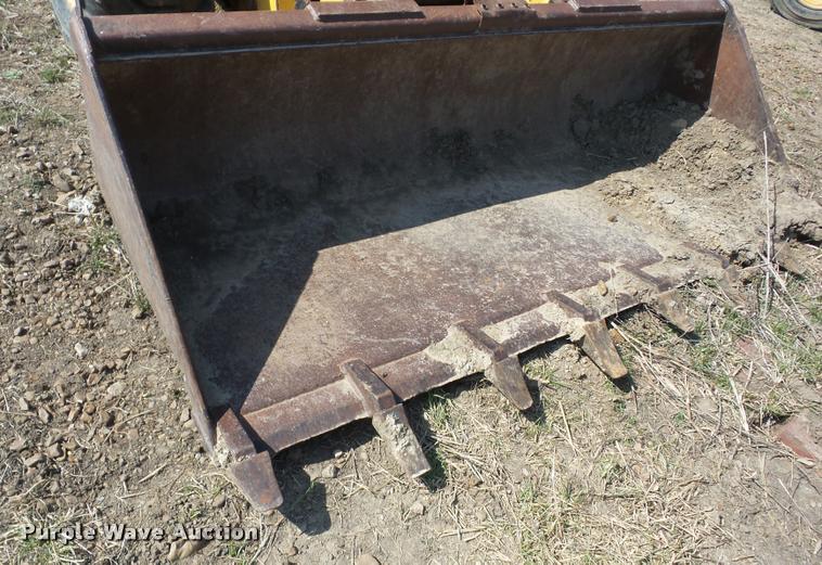 image for item AG9016 2000 John Deere 270 skid steer