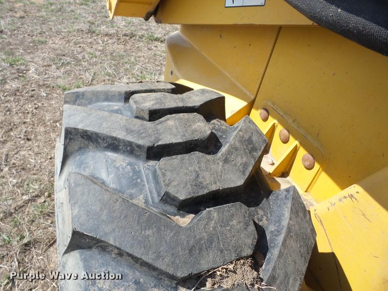 image for item AG9016 2000 John Deere 270 skid steer