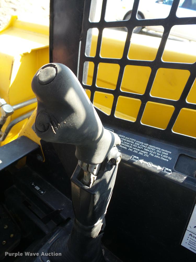 image for item AG9016 2000 John Deere 270 skid steer