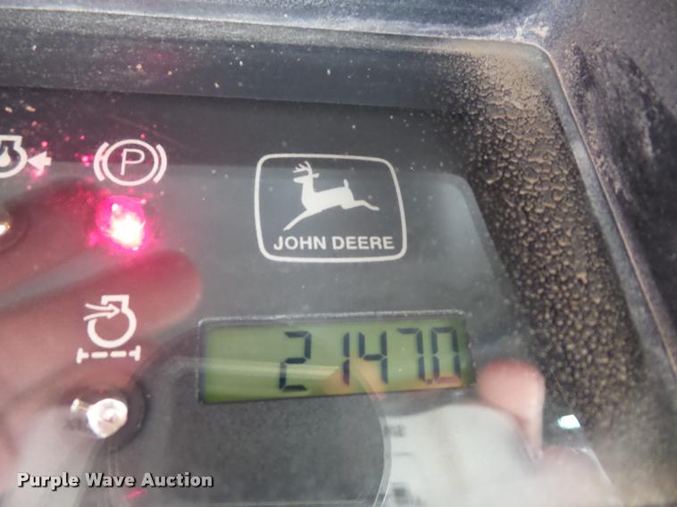 image for item AG9016 2000 John Deere 270 skid steer