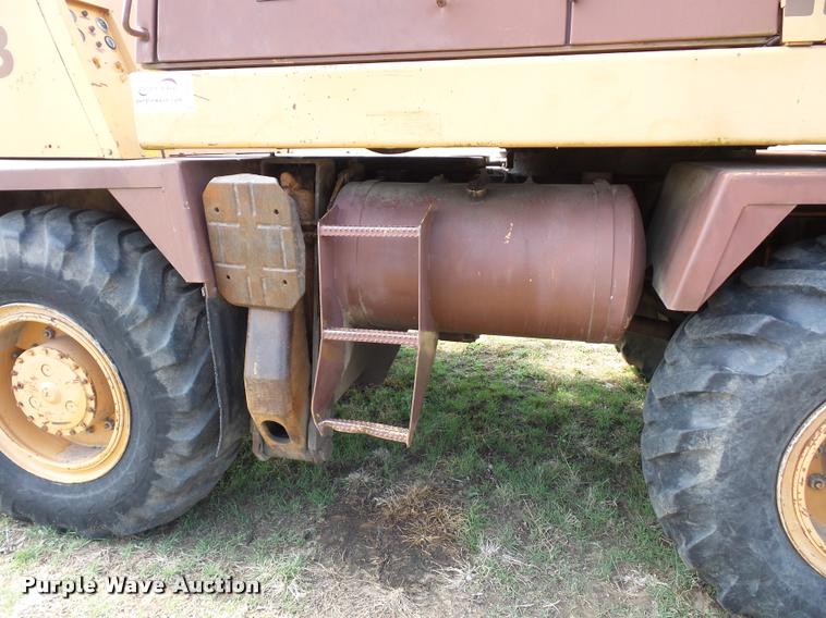 image for item BH9302 1985 Case 1085B rubber tire excavator