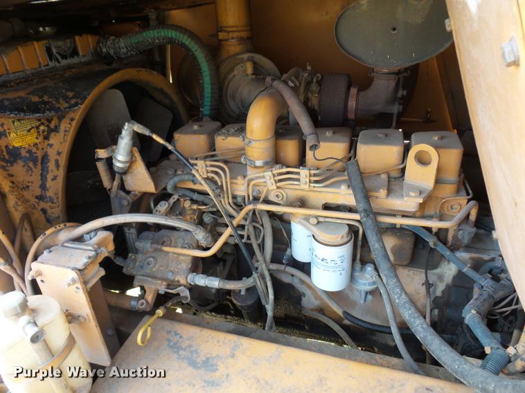 image for item BH9302 1985 Case 1085B rubber tire excavator