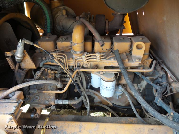 image for item BH9302 1985 Case 1085B rubber tire excavator