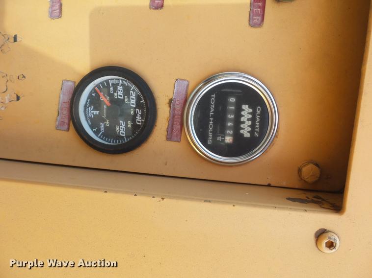 image for item BH9302 1985 Case 1085B rubber tire excavator