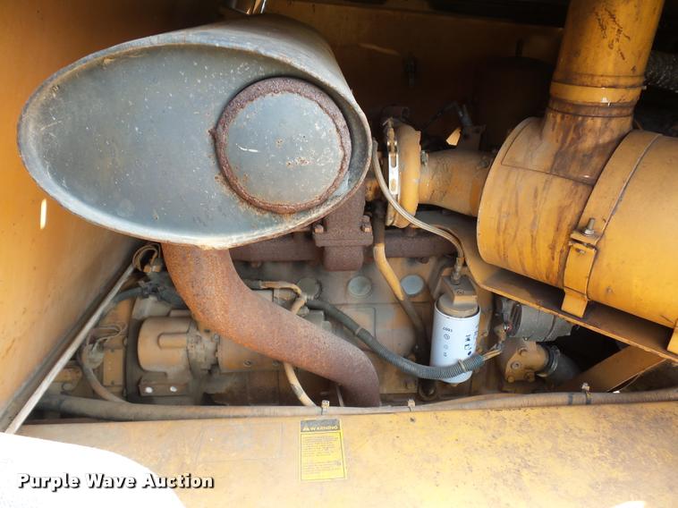 image for item BH9302 1985 Case 1085B rubber tire excavator