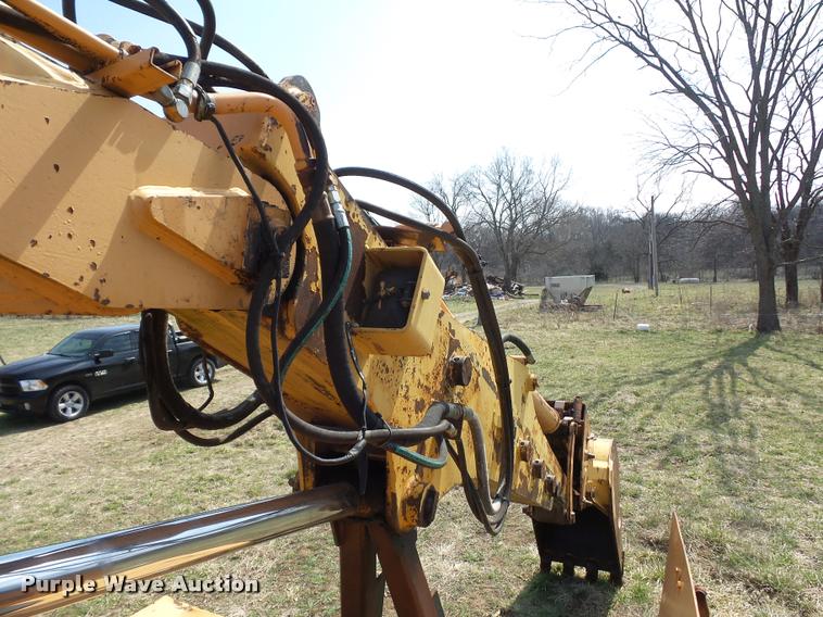 image for item BH9302 1985 Case 1085B rubber tire excavator