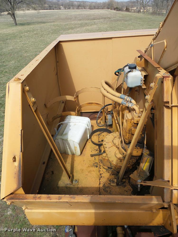 image for item BH9302 1985 Case 1085B rubber tire excavator