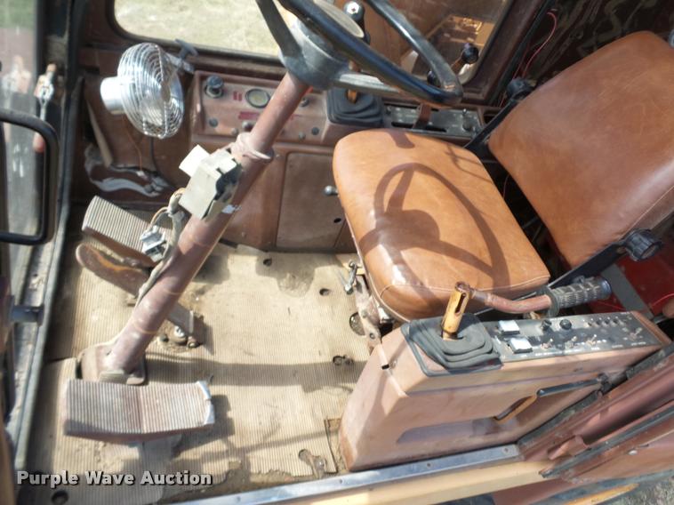 image for item BH9302 1985 Case 1085B rubber tire excavator