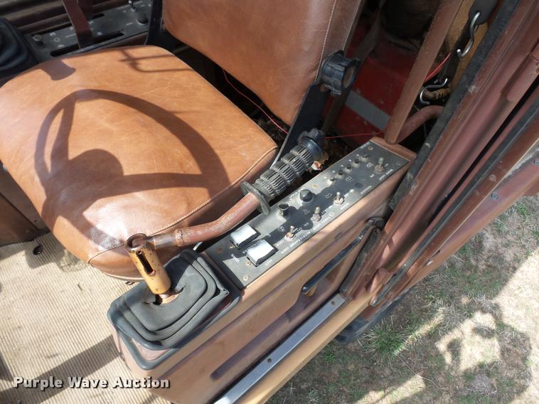 image for item BH9302 1985 Case 1085B rubber tire excavator