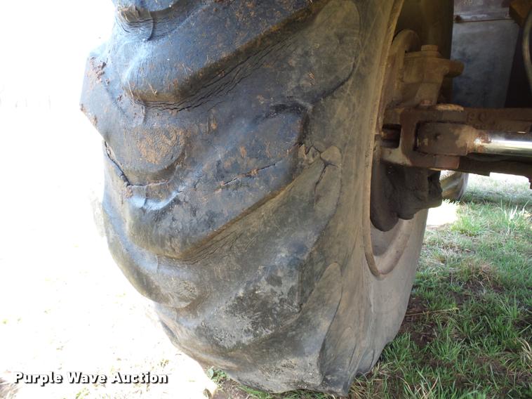 image for item BH9302 1985 Case 1085B rubber tire excavator
