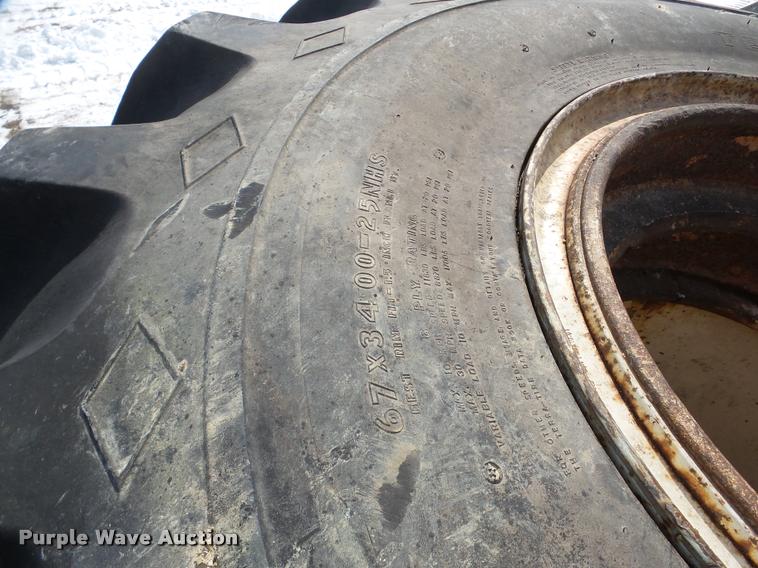 image for item DA1752 (2) Goodyear 67 x 34.00-25NHS tires