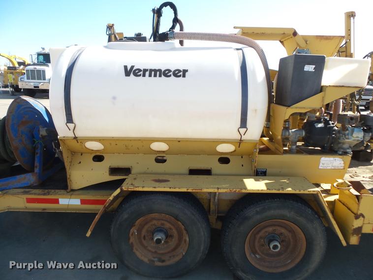 image for item DC9513 1999 Vermeer D7X11A Navigator directional drill and trailer