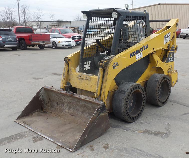 image for item J1567 2006 Komatsu SK820 skid steer