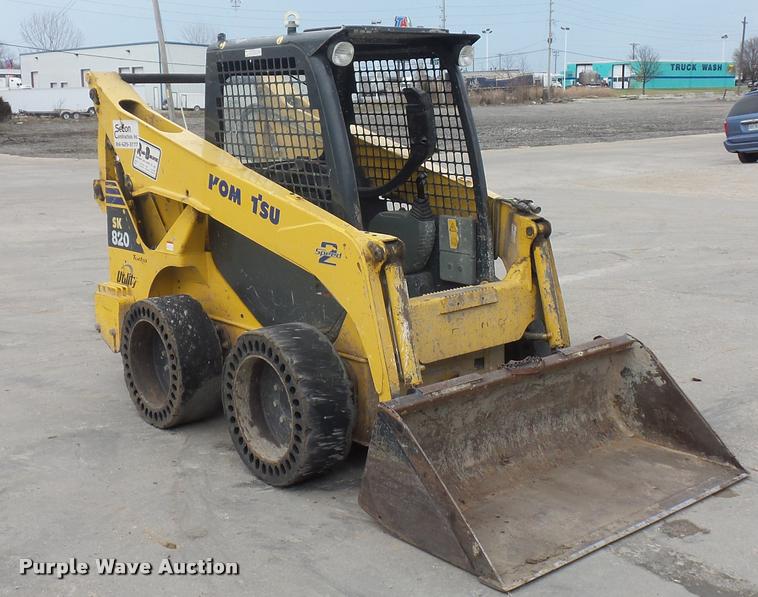image for item J1567 2006 Komatsu SK820 skid steer