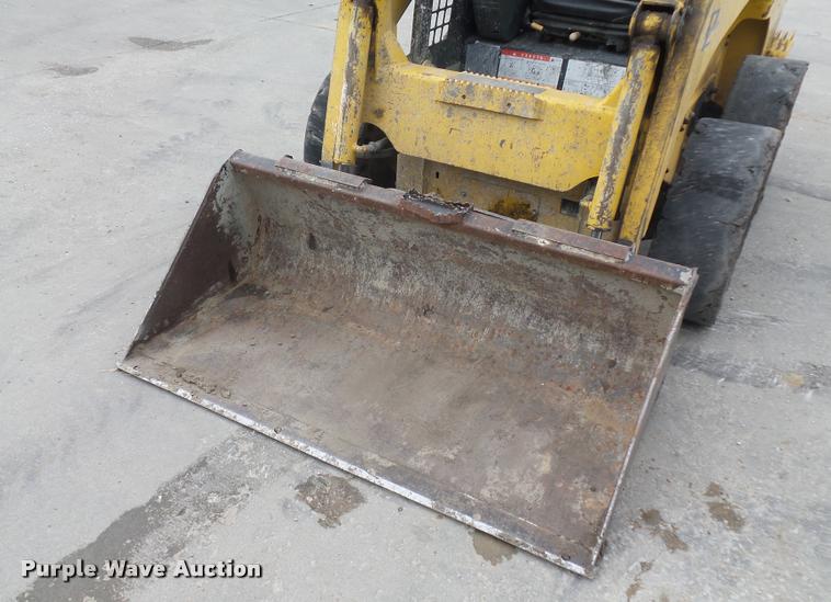 image for item J1567 2006 Komatsu SK820 skid steer