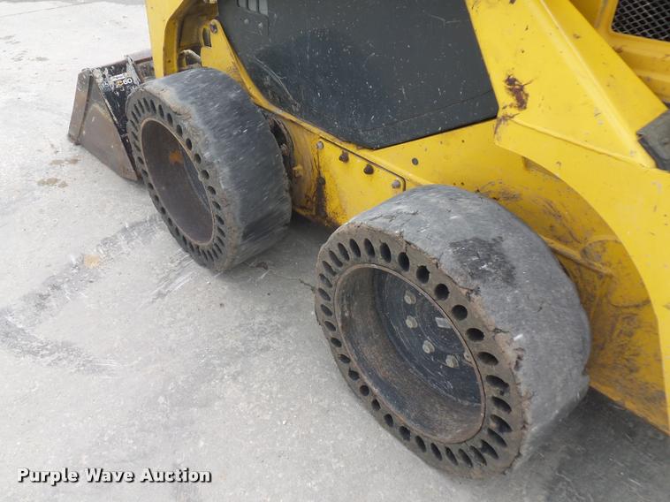 image for item J1567 2006 Komatsu SK820 skid steer