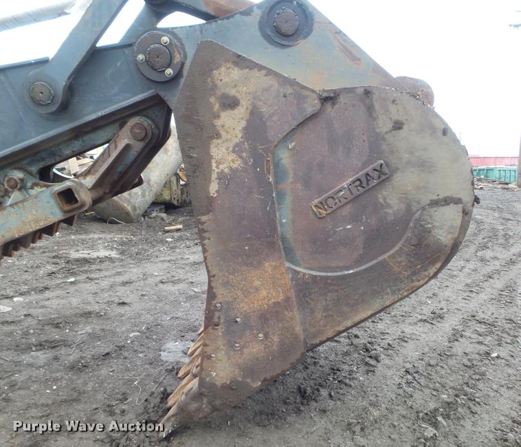 image for item K7696 2006 John Deere 350D excavator stick and bucket