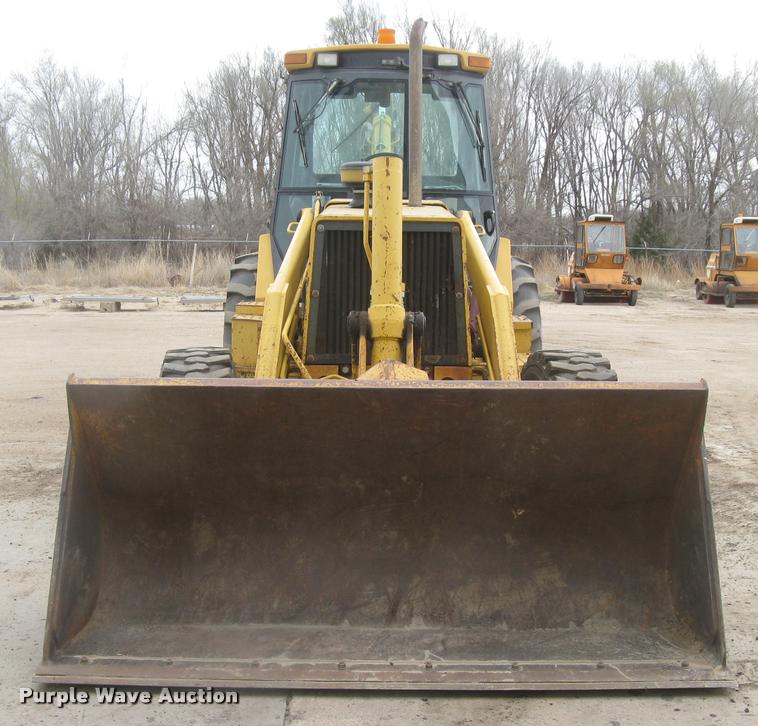 image for item L3987 1995 John Deere 710D backhoe