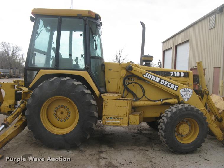 image for item L3987 1995 John Deere 710D backhoe