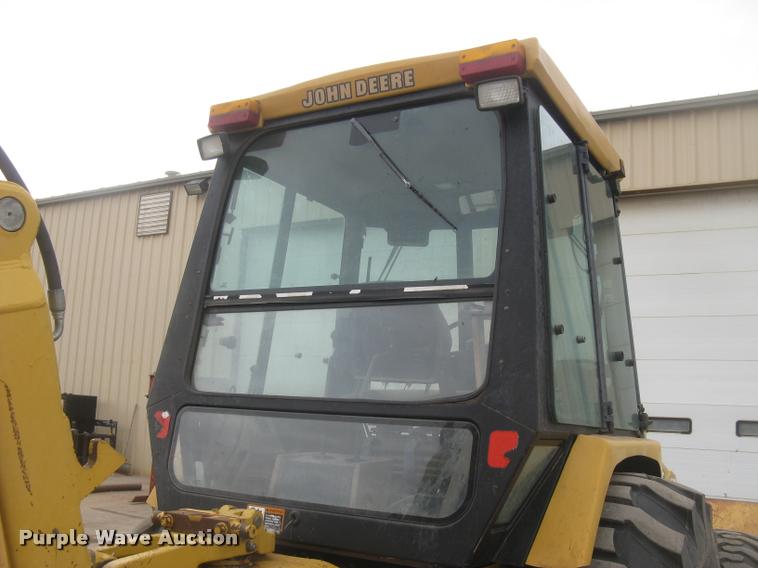 image for item L3987 1995 John Deere 710D backhoe