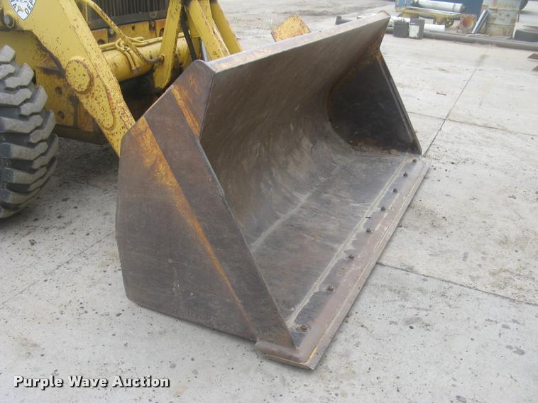 image for item L3987 1995 John Deere 710D backhoe