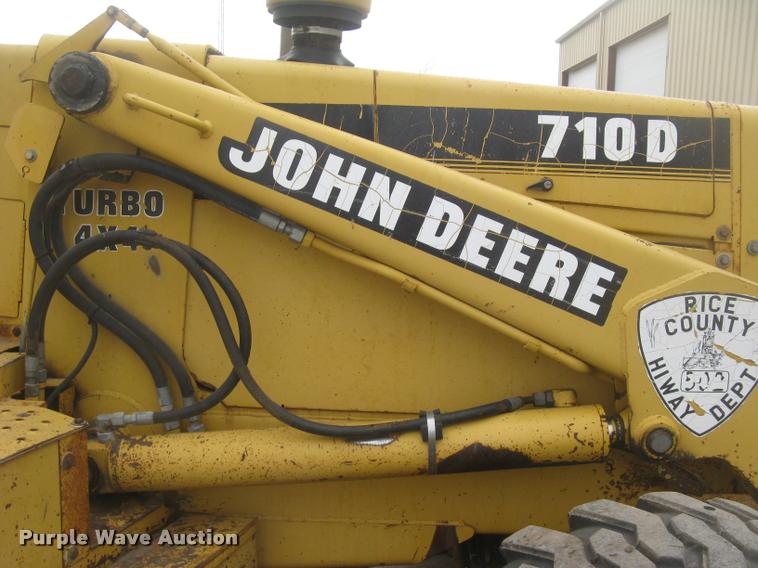 image for item L3987 1995 John Deere 710D backhoe