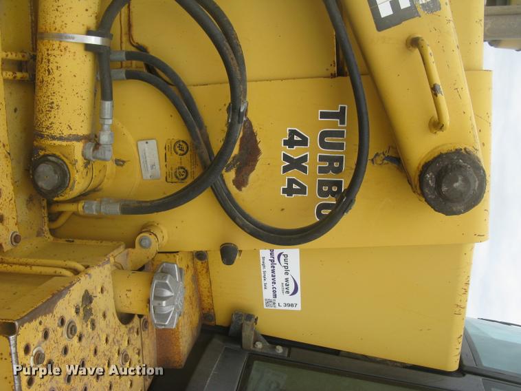 image for item L3987 1995 John Deere 710D backhoe