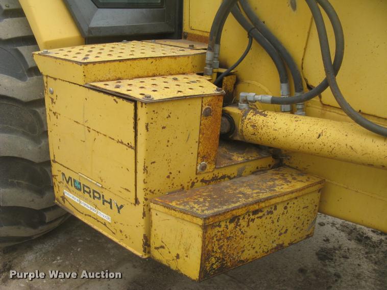 image for item L3987 1995 John Deere 710D backhoe