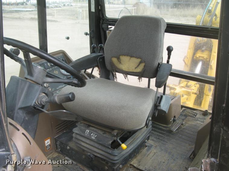 image for item L3987 1995 John Deere 710D backhoe